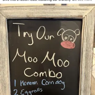 a sign for moo moo bubble tea house