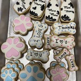 a tray of decorated cookies