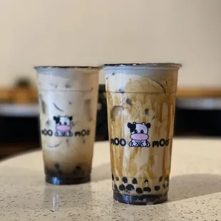 Front: Dirty Jasmine Milk Tea  Back: Moo Moos Latte