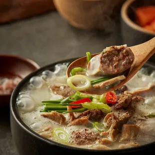 a spoon full of soup