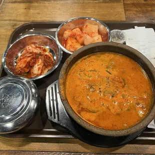 Spicy soondae soup, comes with rice and two types of kimchi