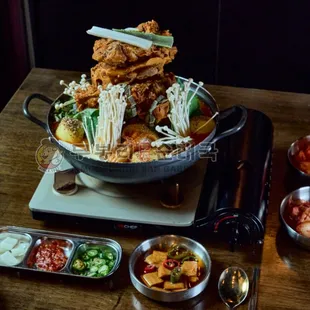 Gamjatang: Pork back bone on spicy soup