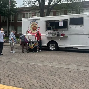 Food trucks in front of Moody Hall