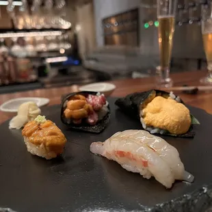 Wagyu uni handroll, tomato ricotta handroll, uni &amp; ebi nigiri