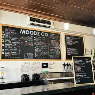 menus on the wall of a coffee shop