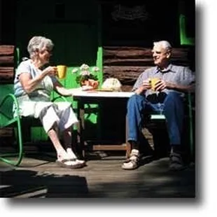 Mook and Pop enjoying an oatmeal raisin cookie on their porch