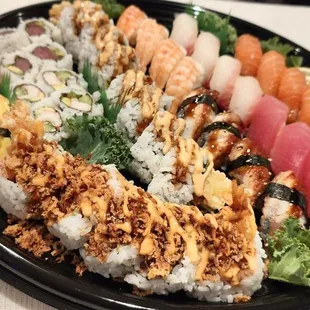 a large plate of sushi
