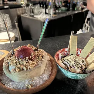 Coconut rice pudding with hibiscus sorbet and almond crumble (left). Banana ice cream and dulce de leche wafers (right).