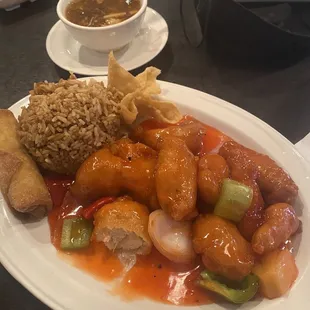 Sweet and sour chicken lunch special with fried rice.