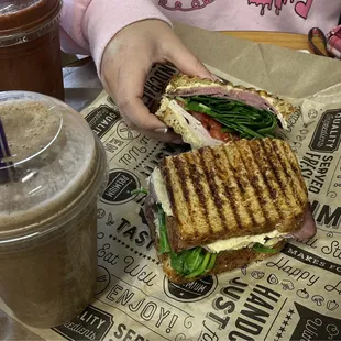 a person eating a sandwich