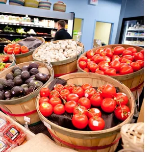 a variety of vegetables in baskets