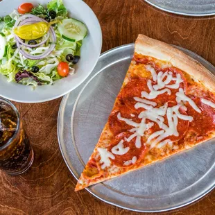 $7.99 Lunch Combo. Huge 1 top slice + salad + drink.