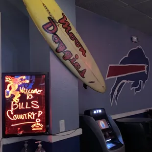 a surfboard hanging on the wall