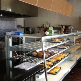a woman standing in front of the counter