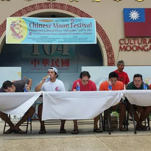 Men's moon cake eating contest.