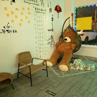 a teddy bear and chairs