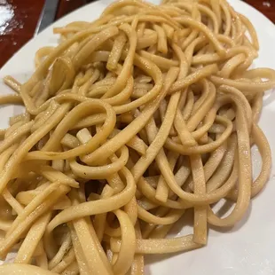 a plate of pasta on a table