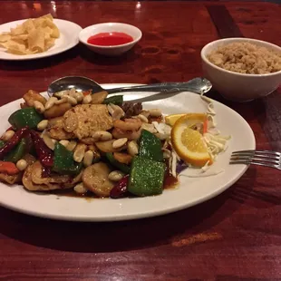 Combo Kung Pao w/ shrimp, chicken, beef with a side of fried rice.