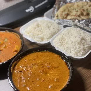 Chicken Vindaloo, Chicken Makhni, and Garlic Naan Bread