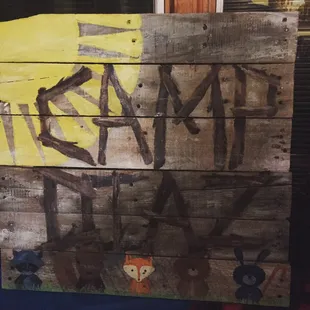 A sign painted by Shari Moon for the baby shower