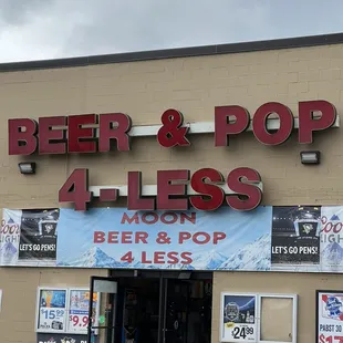 the front of a beer and pop 4 less