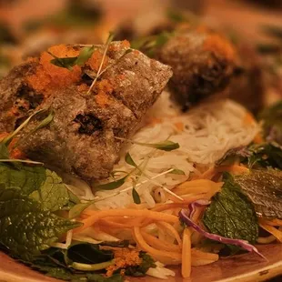 Crab pockets atop vermicelli