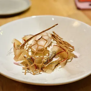 Apple | Quả Táo robiola cheesecake, compressed cosmic apples, malted barley streusel pink apple sorbet, sake, honey