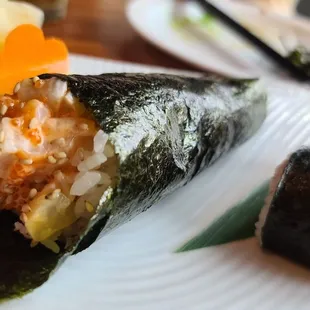 Spicy clam hand roll.