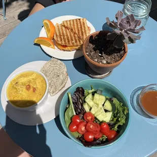Side salad, grilled cheese, cup of curry and bread