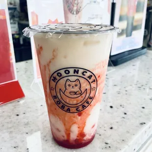"The Yelper" (special drink available week of June 3rd, 2024) - Coconut Flavoured Jasmine Milk Tea w/Strawberry Boba (no dairy)