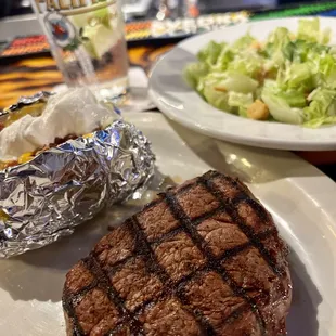 Sirloin Dinner, Loaded Baked Potato and a Side Caesar Salad.