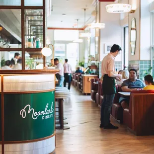 a man standing at the counter