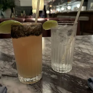 two cocktails on a table