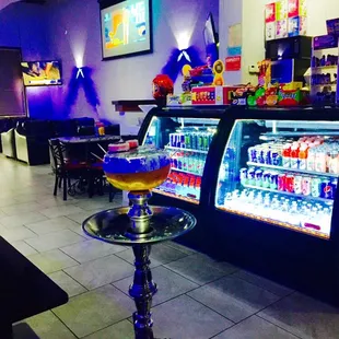 a glass of alcohol on a hookah