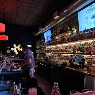 a bartender at the bar