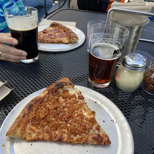 My sausage slice and wifey&apos;s pepperoni.