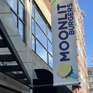 Moonlit sign, at what was the former Red Ring Bar &amp; Grill.