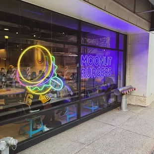 a neon sign in the window