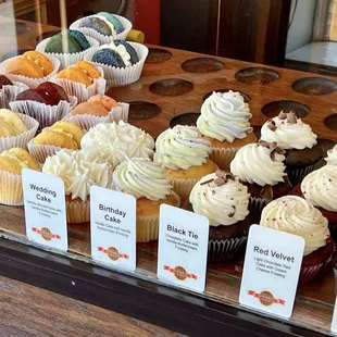Moonies to the left and cupcakes in the center.