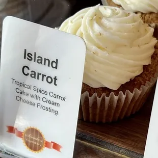 a cupcake with cream frosting