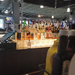 a view of the bar from behind the counter