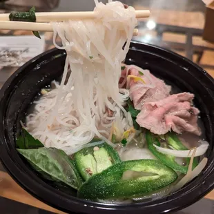 Pho with brisket and rare steak