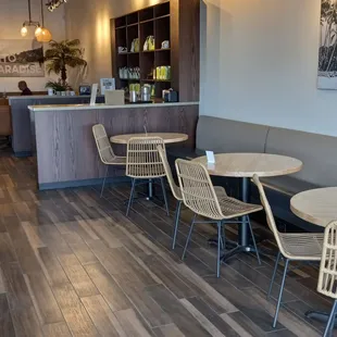 tables and chairs in a coffee shop