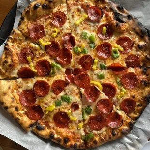 Pepperoni, green pepper, and banana peppers