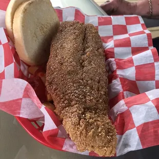 a fish sandwich in a basket
