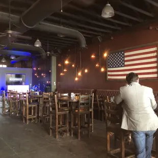 a man and a woman at a bar