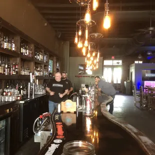 two men behind the bar