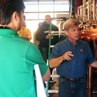 One of MU's faculty, Pete Kamer, educating attendees in the distillery.