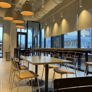 tables and chairs in a coffee shop