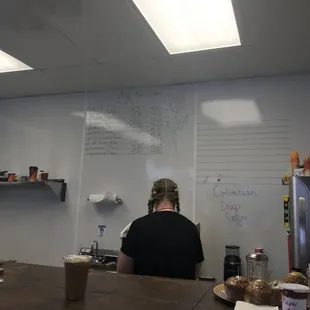 a woman sitting at a counter